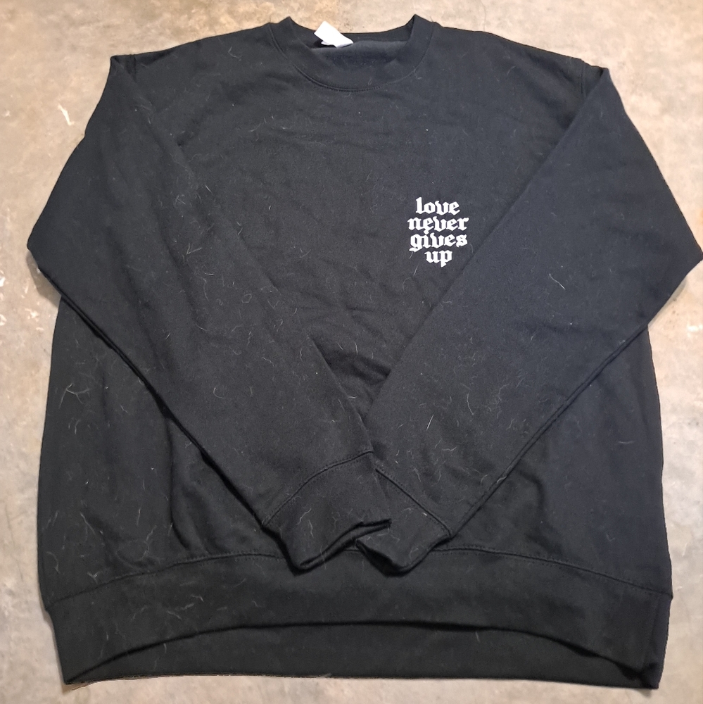"Love Never Gives Up" sweatshirt